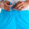 PANTALON CORTO NEW BALANCE SPORT ESSENTIAL 2IN1 3" MUJER